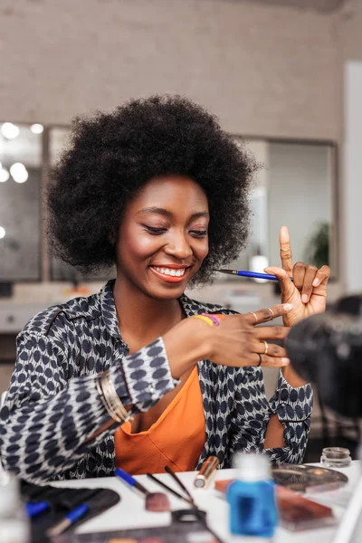 Beautiful dark-skinned african american woman feeling happy