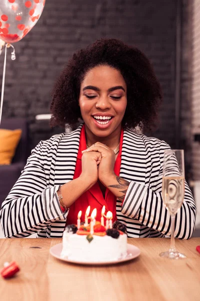 Cheerful positive woman preparing to blow the candles — Stock Photo, Image