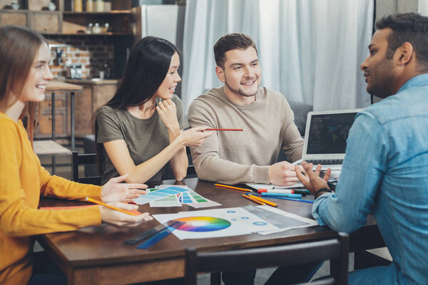 Jolly four colleagues planning startup