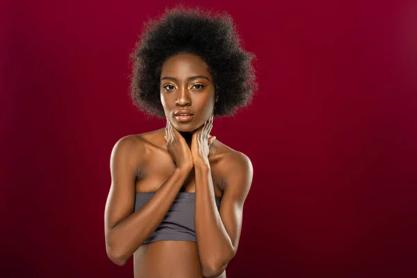 Nice pleasant young woman touching her neck — Stock Photo, Image