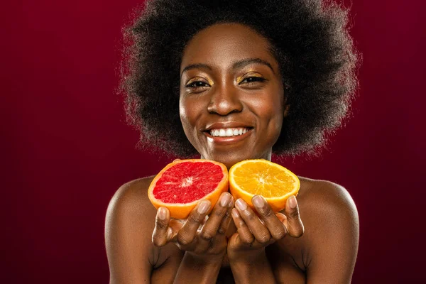 Delighted friendly woman offering you fresh fruits