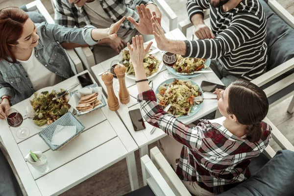 Top view of friendly people that touching hands — Stock Photo, Image