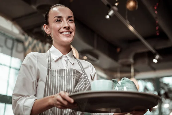 Happy female person working with great pleasure — Stock Photo, Image