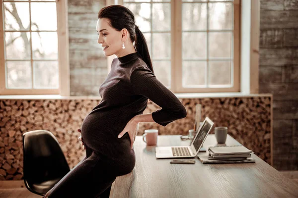 Positive pregnant woman being in the office — Stock Photo, Image