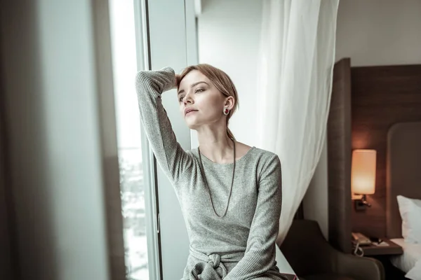 Woman feeling relieved after coming home after work — Stock Photo, Image