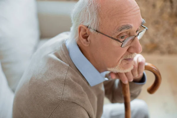 Handsome senior man recollecting past — Stock Photo, Image