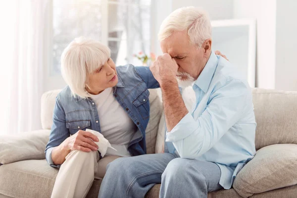 Gentle senior woman consoling her beloved husband — Stock Photo, Image