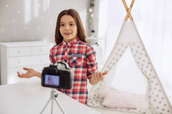 Cute pre-teen girl recording question-and-answer vlog — Stock Photo, Image