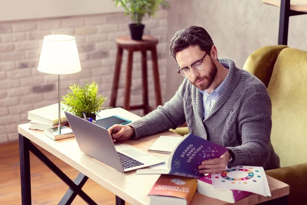 Pleasant bearded man working as an astrologist — Stock Photo, Image