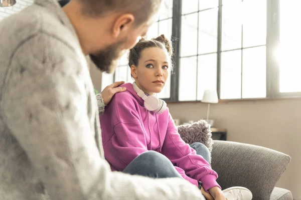 Father calming beautiful teenage daughter feeling stressed — Stock Photo, Image