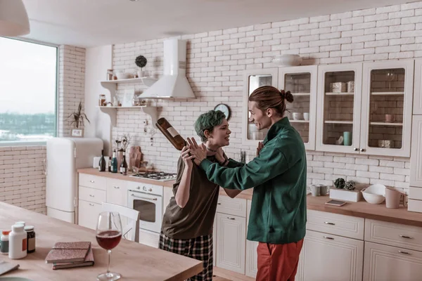 Husband calming his wife being drunk in the morning — Stock Photo, Image