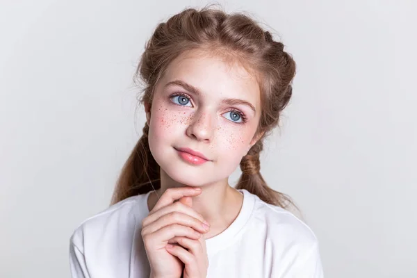 Pleasant sinless little child looking up with her big eyes — Stock Photo, Image