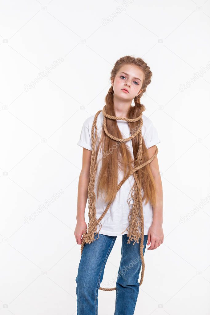 Emotionless apathy little girl having thick rope all over her skinny body