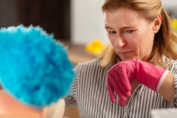 Aged blond-haired woman having strong allergy to dust — Stock Photo, Image