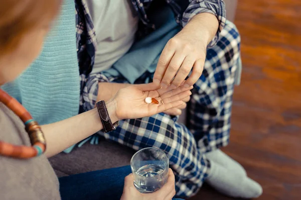 Top view of pills lying on the palm — Stock Photo, Image