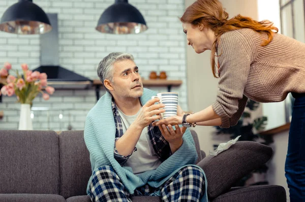 Pleasant mature man looking at his wife — Stock Photo, Image