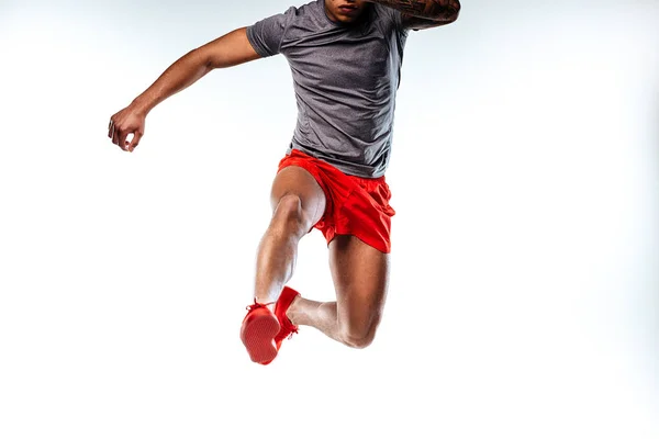 Jumping man wearing stylish and comfortable sportswear — Stock Photo, Image