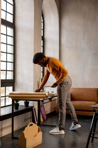 Nice African American man being in his studio — Stock Photo, Image