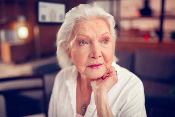 Beautiful blue-eyed aged lady feeling excited and happy — Stock Photo, Image