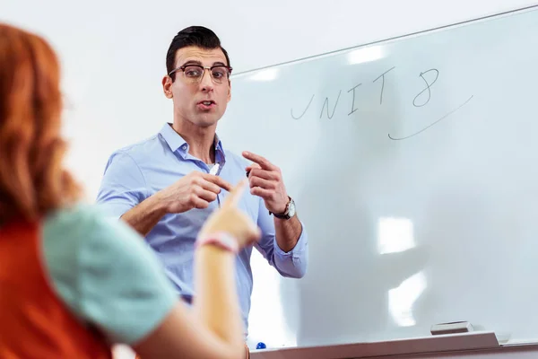 Nice handsome man helping his student to remember — Stock Photo, Image