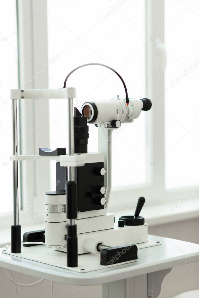 Tall complicated device for intense ophthalmology diagnoses