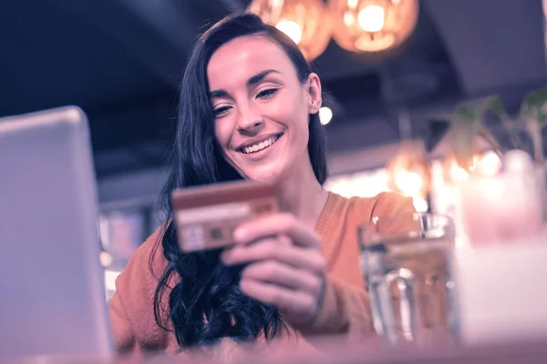 Online Banking Delighted Nice Woman Looking Her Credit Card While — Stock Photo, Image