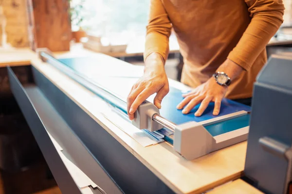 Close up of man using modern printing technique — Stock Photo, Image