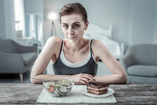 Anorexic brunette girl looking straight at camera — Stock Photo, Image