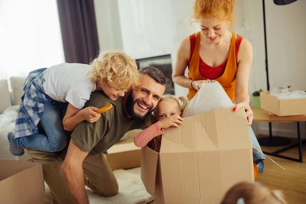 Delighted nice family starting living in a new house — Stock Photo, Image