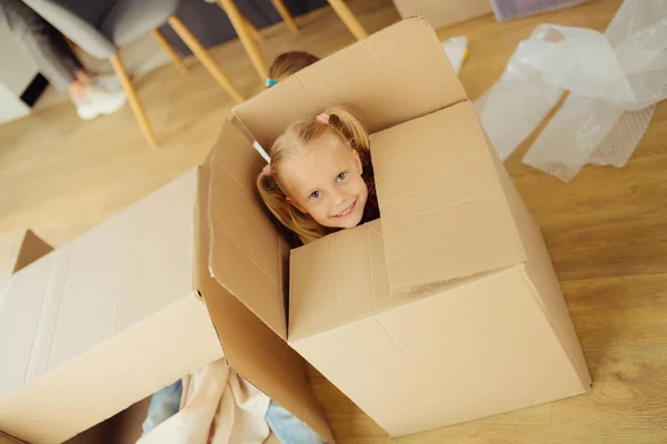 Top view of a pretty cute girl in the box — Stock Photo, Image