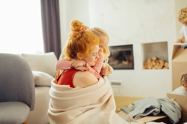 Pleasant cute nice girl hugging her mother — Stock Photo, Image