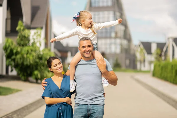 Daughter feeling truly happy and free having family walk — Stock Photo, Image