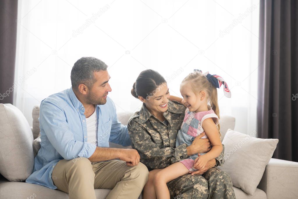 Family feeling happy while reuniting at home