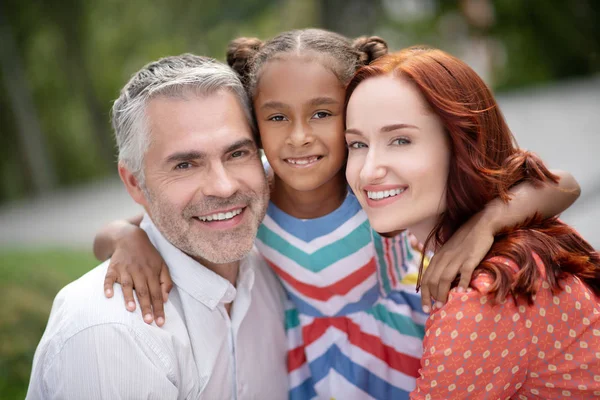 Happy family feeling amazing while spending time together — Stock Photo, Image