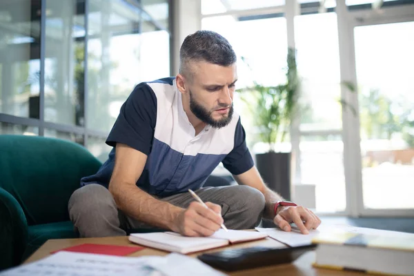 Freelancer feeling busy while working with documents — Stock Photo, Image