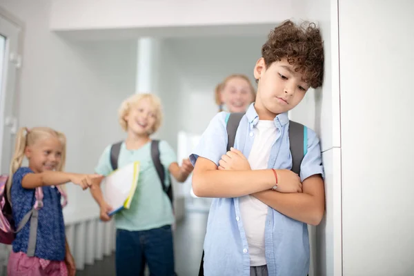Boy feeling lonely and isolated suffering from bullying — Stock Photo, Image