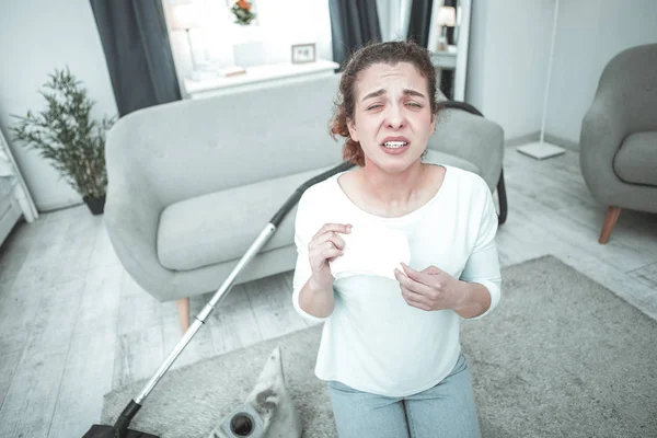 Woman sneezing and coughing having allergy to house moss