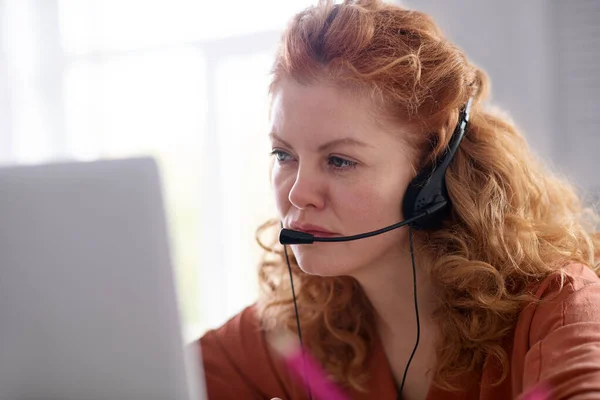 Curly woman working while feeling awful and sick — Stock Photo, Image