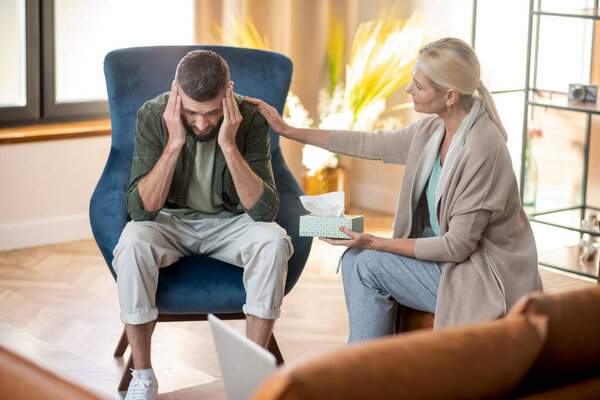 Psychoanalyst supporting client who feeling very depressed