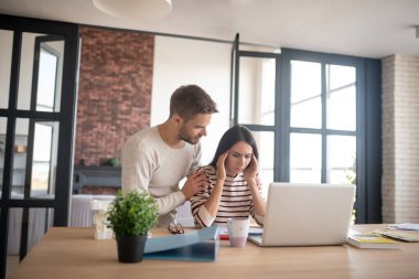 Wife suffering from headache after working for tool long