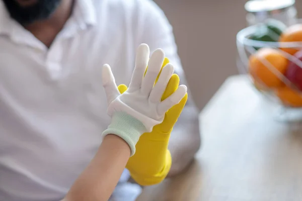 Close up picture of mans and kids hand doing high five — Stock Photo, Image