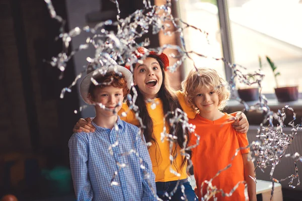 Three cute kids enjoying a birthday party — Stock Photo, Image