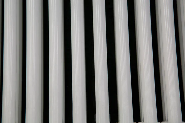 Heizungsrohre Sind Aus Kunststoff Form Mehrerer Senkrechter Rohre Konstruktion Hintergrund — Stockfoto