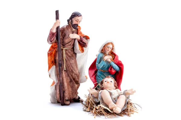 クリスマスのキリスト降誕のシーン マリアとヨセフと飼い葉桶の赤ん坊イエスは白い背景の分離 — ストック写真