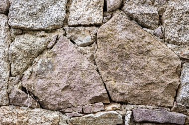 Düzensiz bir taş duvarın dokusu. Arka plan.