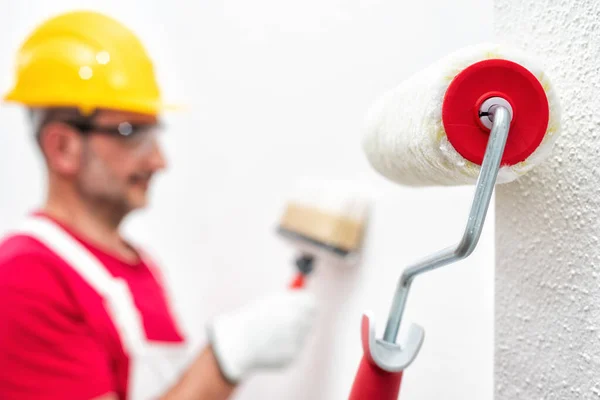 Close-up Of Paint Roller Painting A White Wall. The Wall Has Popcorn Ceiling  Texture. Home Renovation Project Stock Photo, Picture and Royalty Free  Image. Image 150112458.