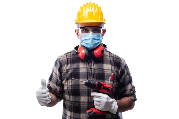 배경에 근로자들은 코로나 바이러스가 퍼지는 수술용 마스크를 착용하며 엄지와 괜찮은 — 스톡 사진