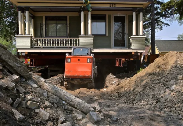 House Foundation Repair Rests Strong Girders Backhoe Removes Concrete Dirt — Stock Photo, Image