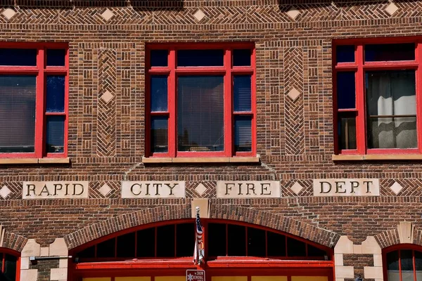 A building front indicates it is the home of the Rapid City Fire Department in South Dakota.
