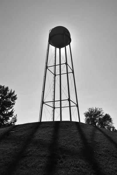 Old Water Tower Standing Top Hill Silhouetted Sky — Stock Photo, Image